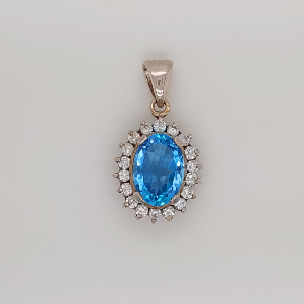 925 Silver Pendant Set With Blue Topaz And Zirconia